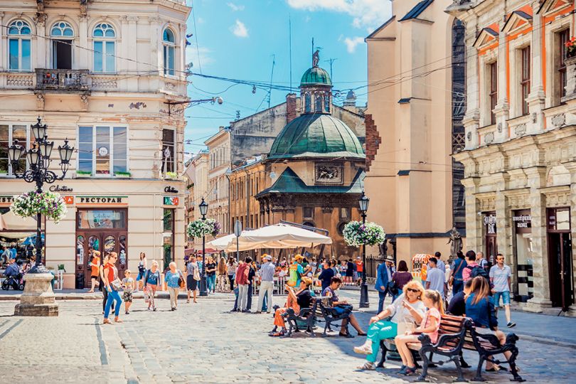 People chilling on the Halytska street in Lviv