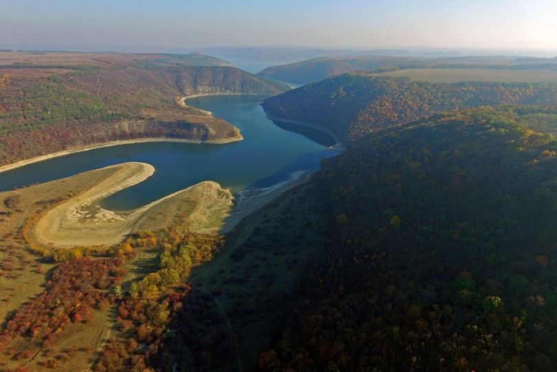 river with hills around