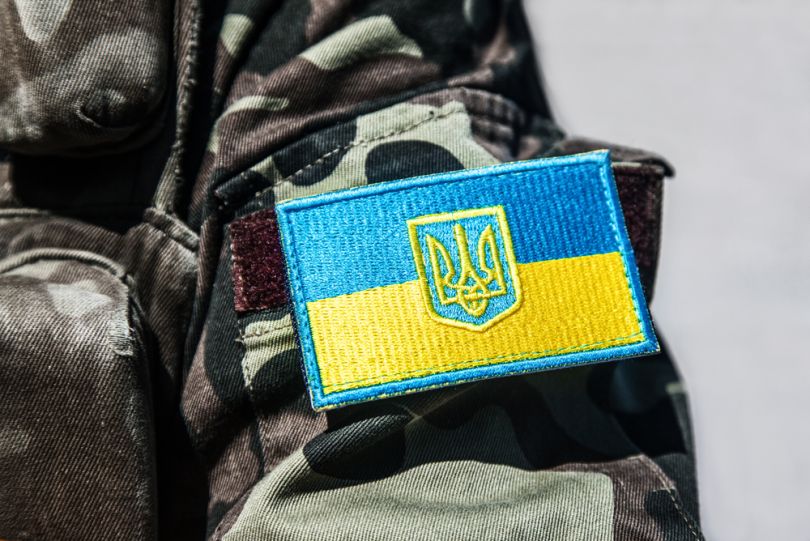 chevron with ukrainian flag on military suit