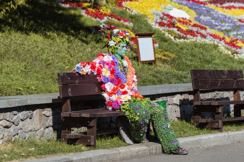 Flower man sitting in a Kyiv park