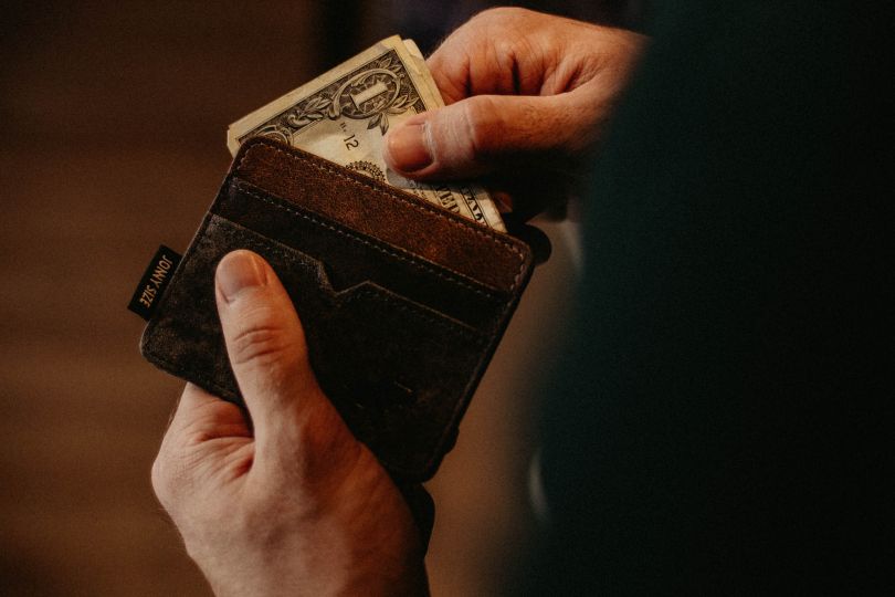 Person holding money