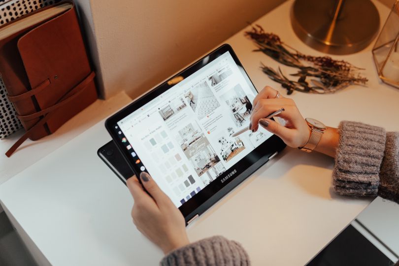 Woman using a black tablet