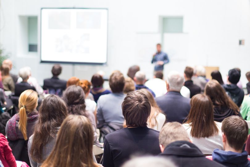 People attending a business forum