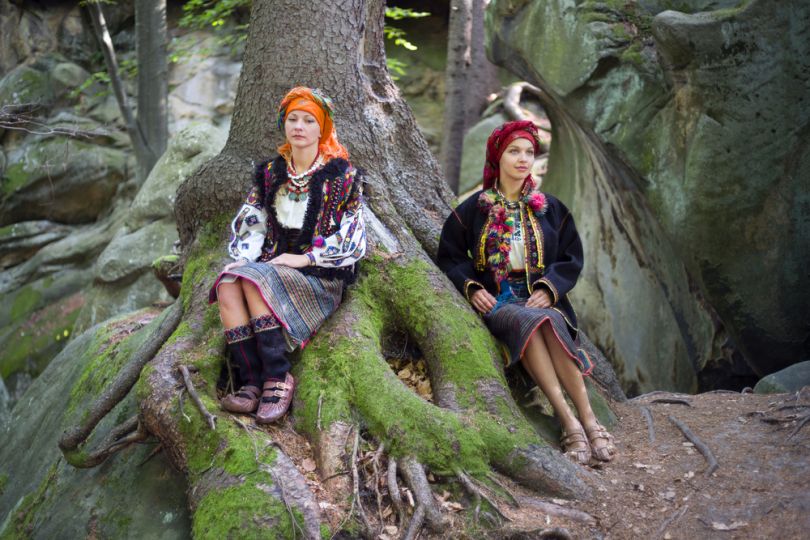 two girls in forest in hutsul clothes