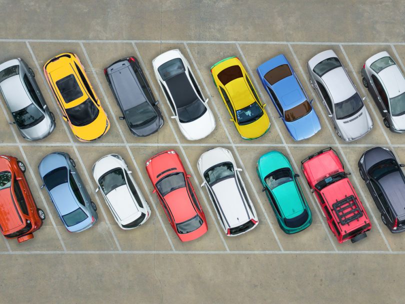 Parking lot filled with colorful cars