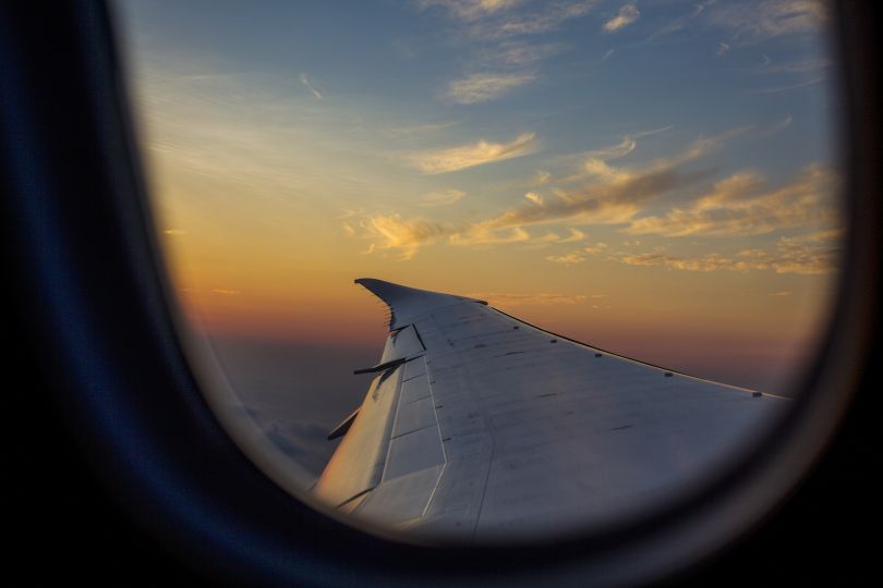 Airplane wing through the window