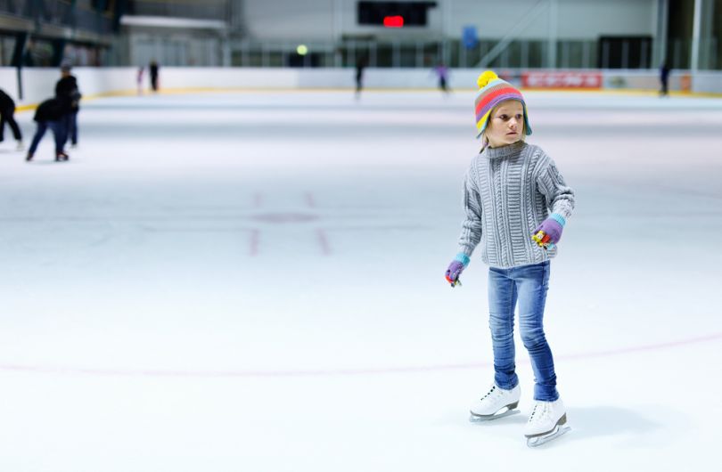 Kid ice skating