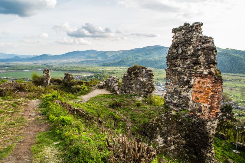 castle ruins and mountain panorama
