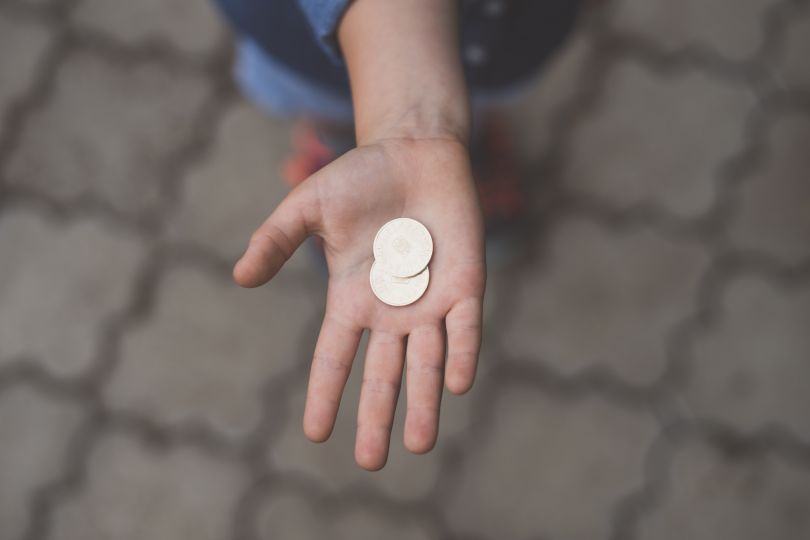 hand with coins