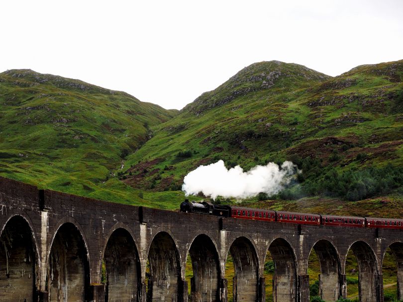 Train riding on viaduct