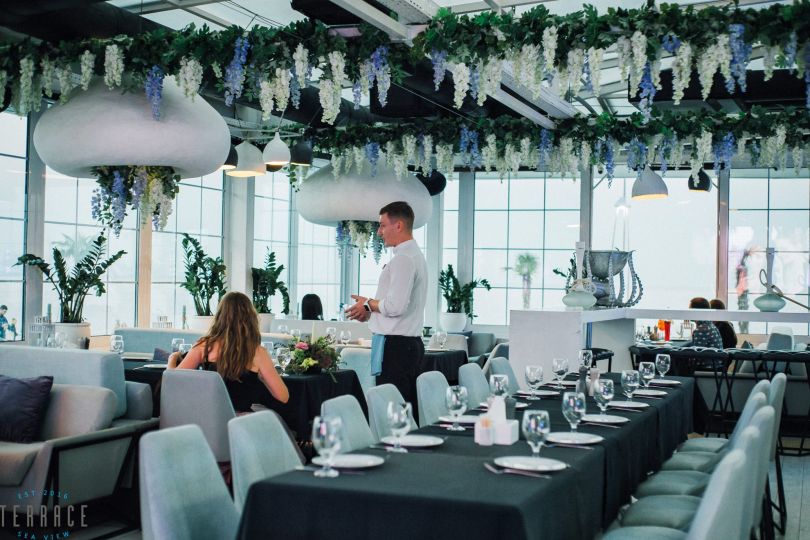 served tables and waiters in restaurant