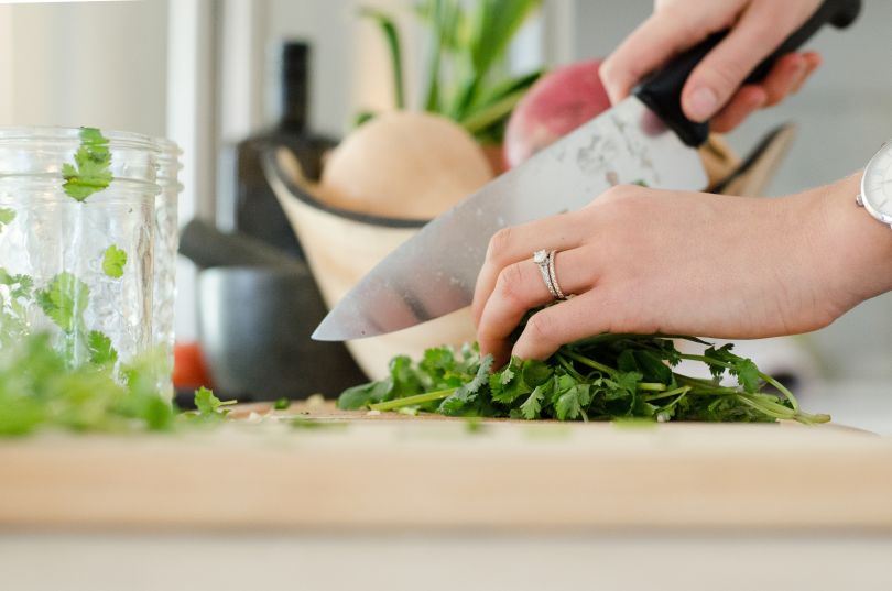 Woman chopping vegetables