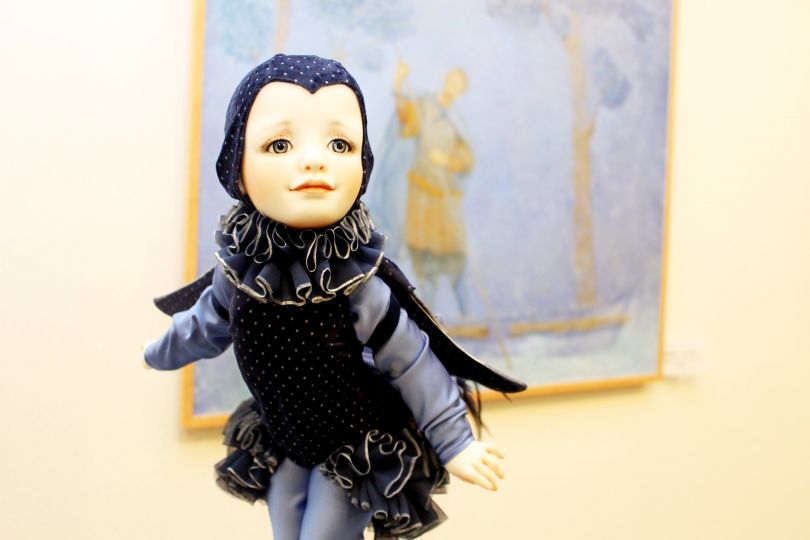 doll with painting on background