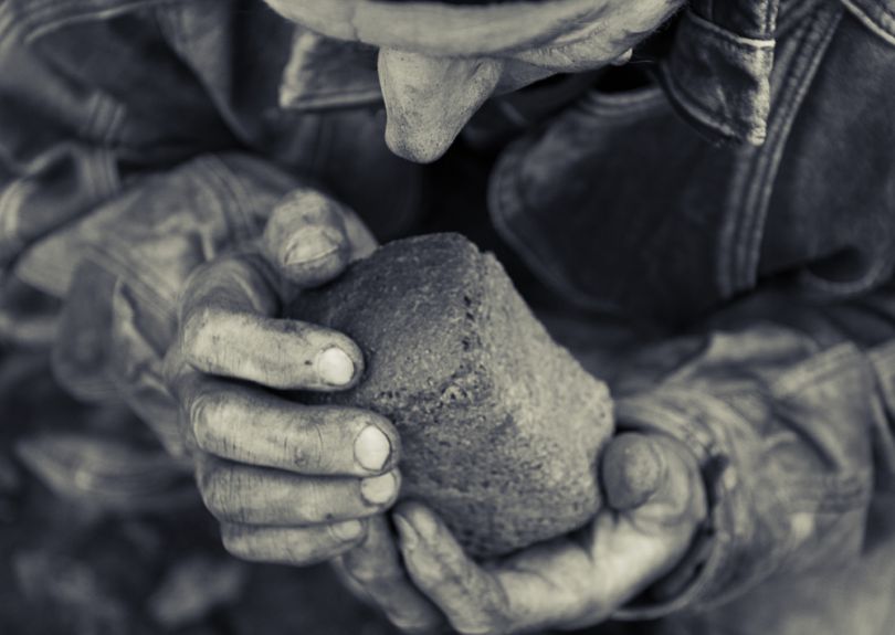 man holding bread