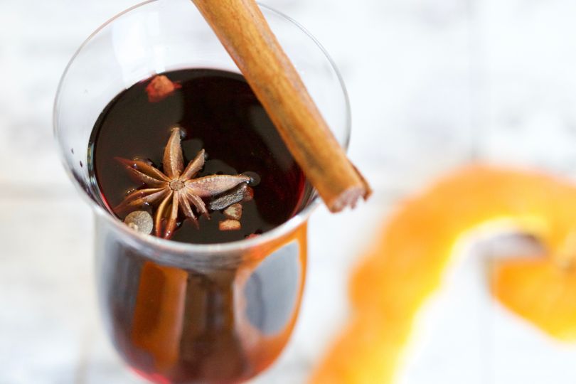 glass of mulled wine with cinnamon
