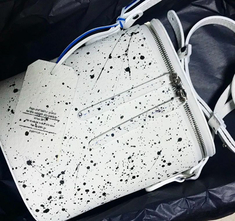 stylish white bag with black dots
