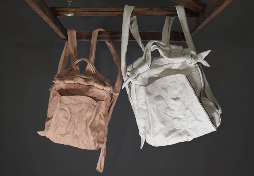 two stylish designer bags