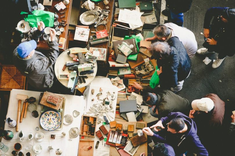 People looking at goods on a flea market