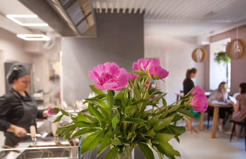 flowers with restaurant hall on background