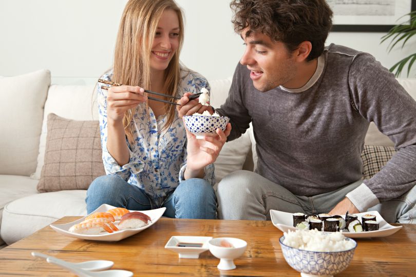 Couple enjoying sushi