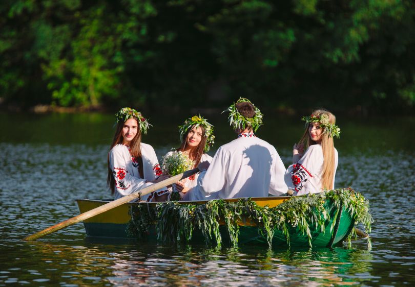 Ukrainians in a boat on Ivana Kupala