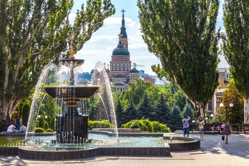 Kharkiv Park with a gleaming church