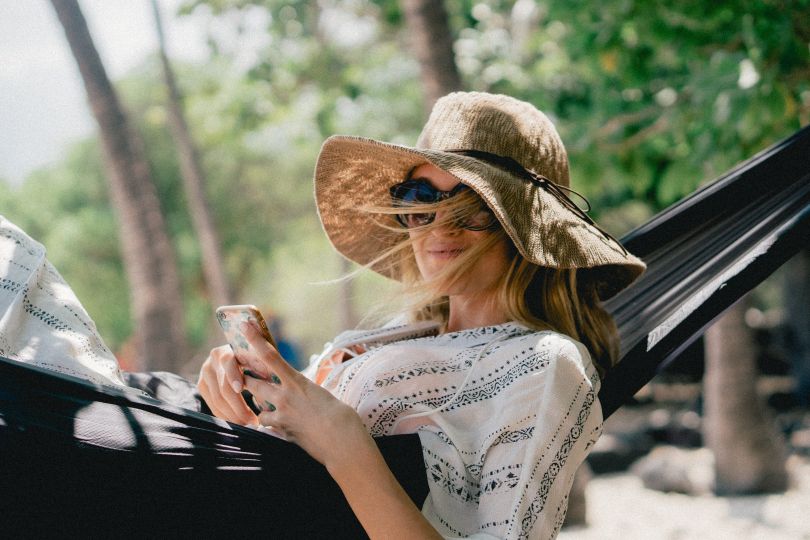 Woman chilling on a hammock