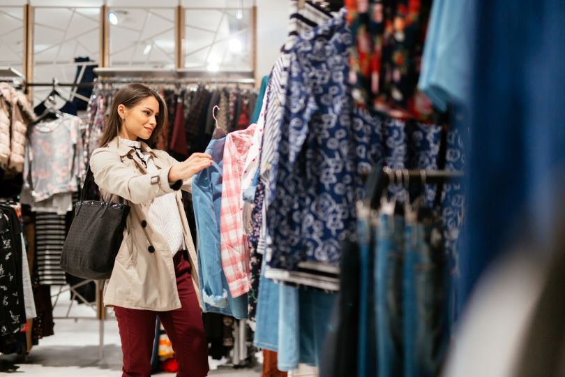 Woman checking out clothes