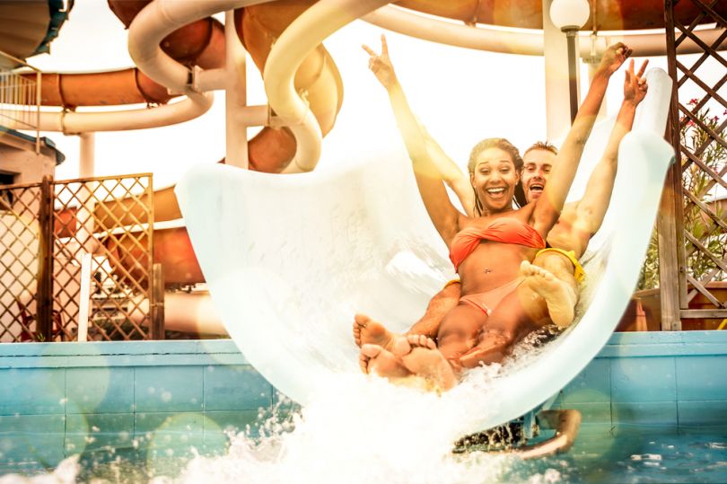 People cheering in a water park